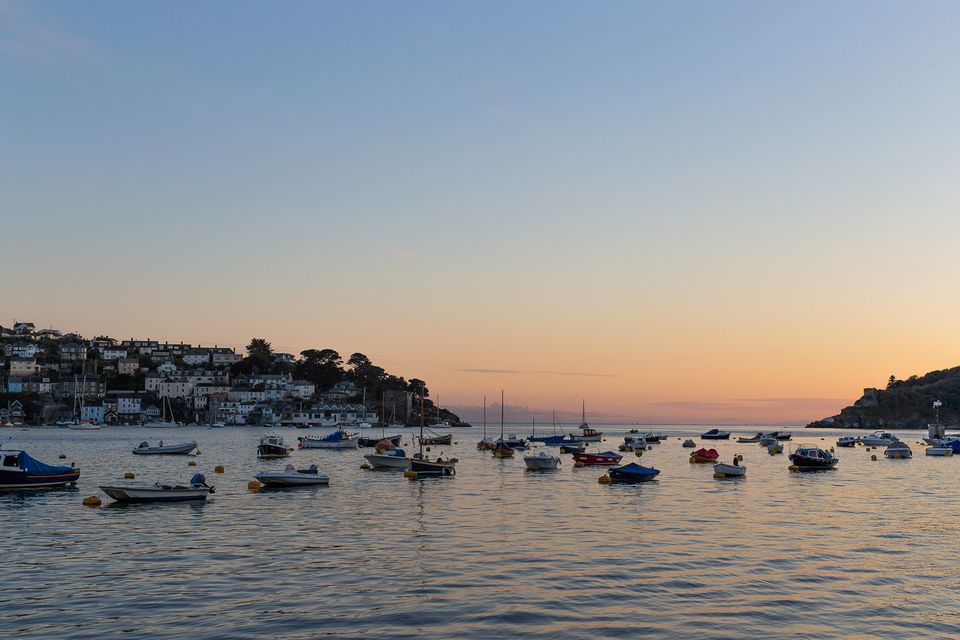 Boats in Fowey at sunset