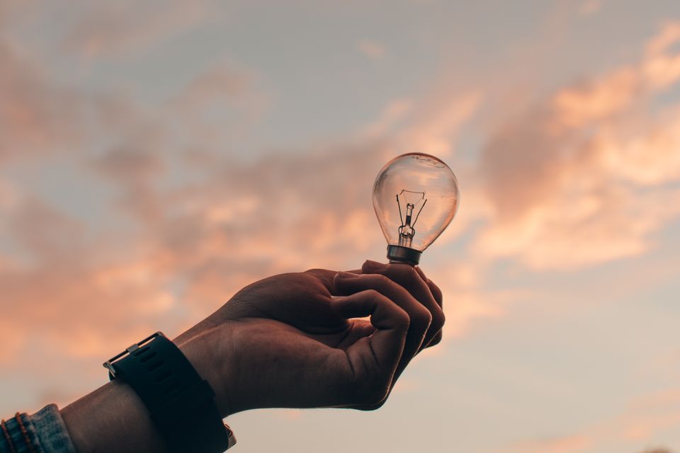 Man holding lightbulb