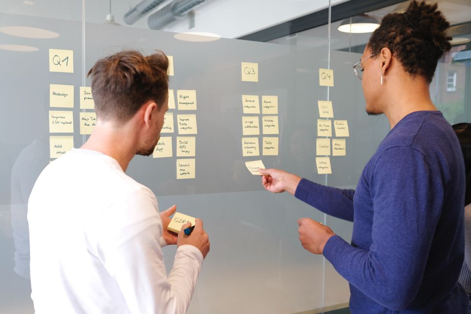 Placing postit notes on glass wall