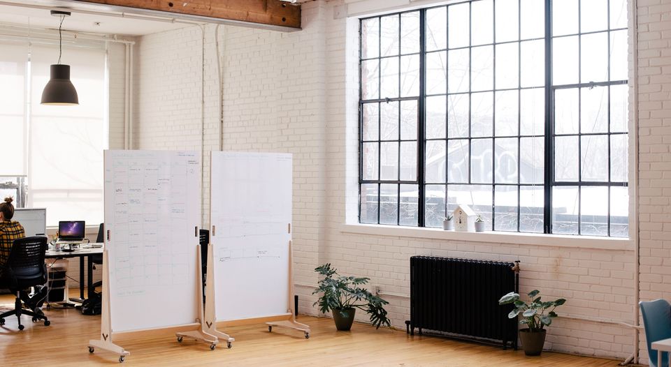 Wireframes written on whiteboard in loft office