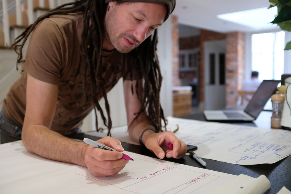 Creative Director Simon working on wireframes
