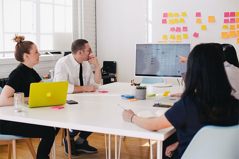 Team discussion in startup office