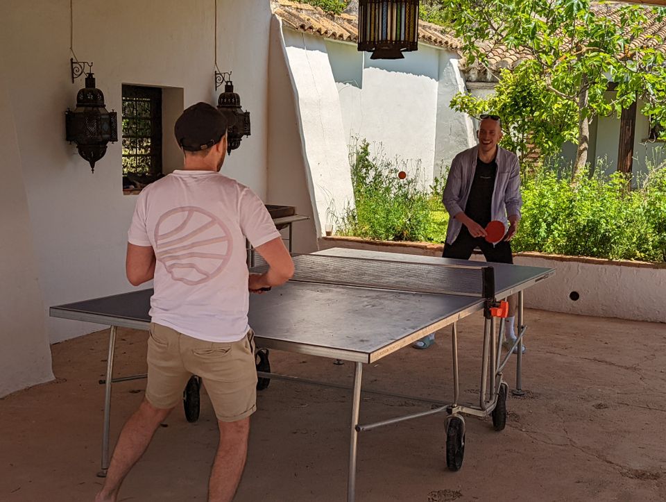 Sam and Matt playing table tennis