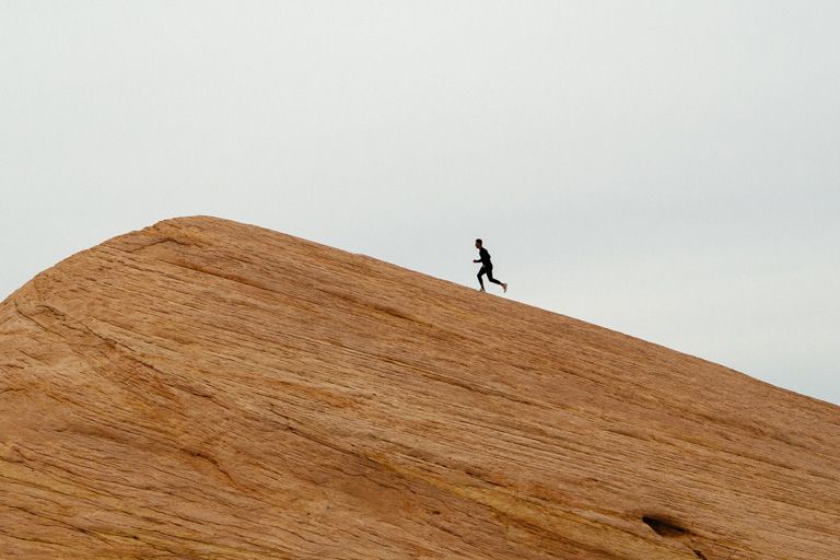 Man running up hill