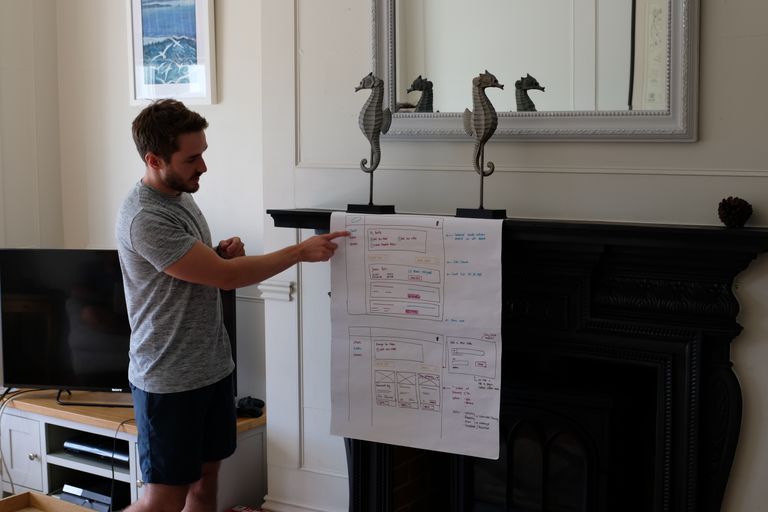 Sam presenting wireframes