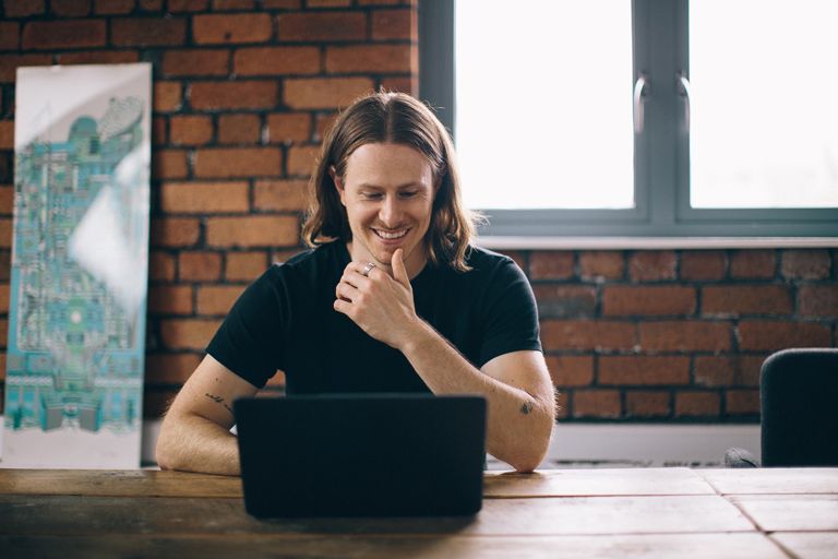 Man learning on MacBook