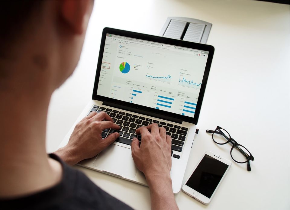 Laptop with data graphs