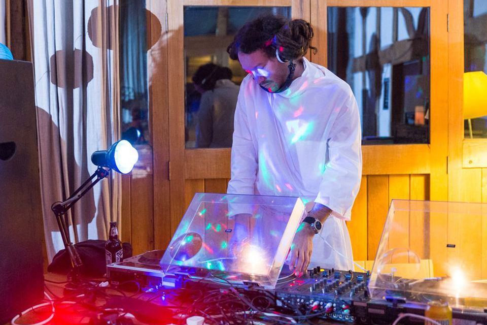 Simon DJing dressed as Princess Leia