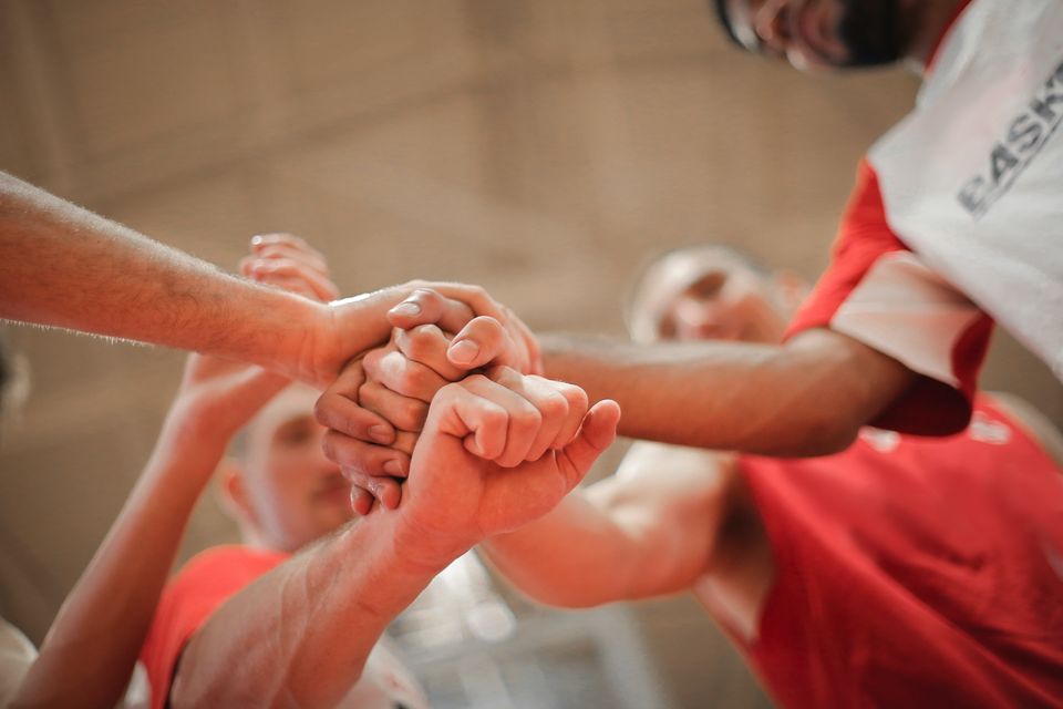 Sports team fist pumping